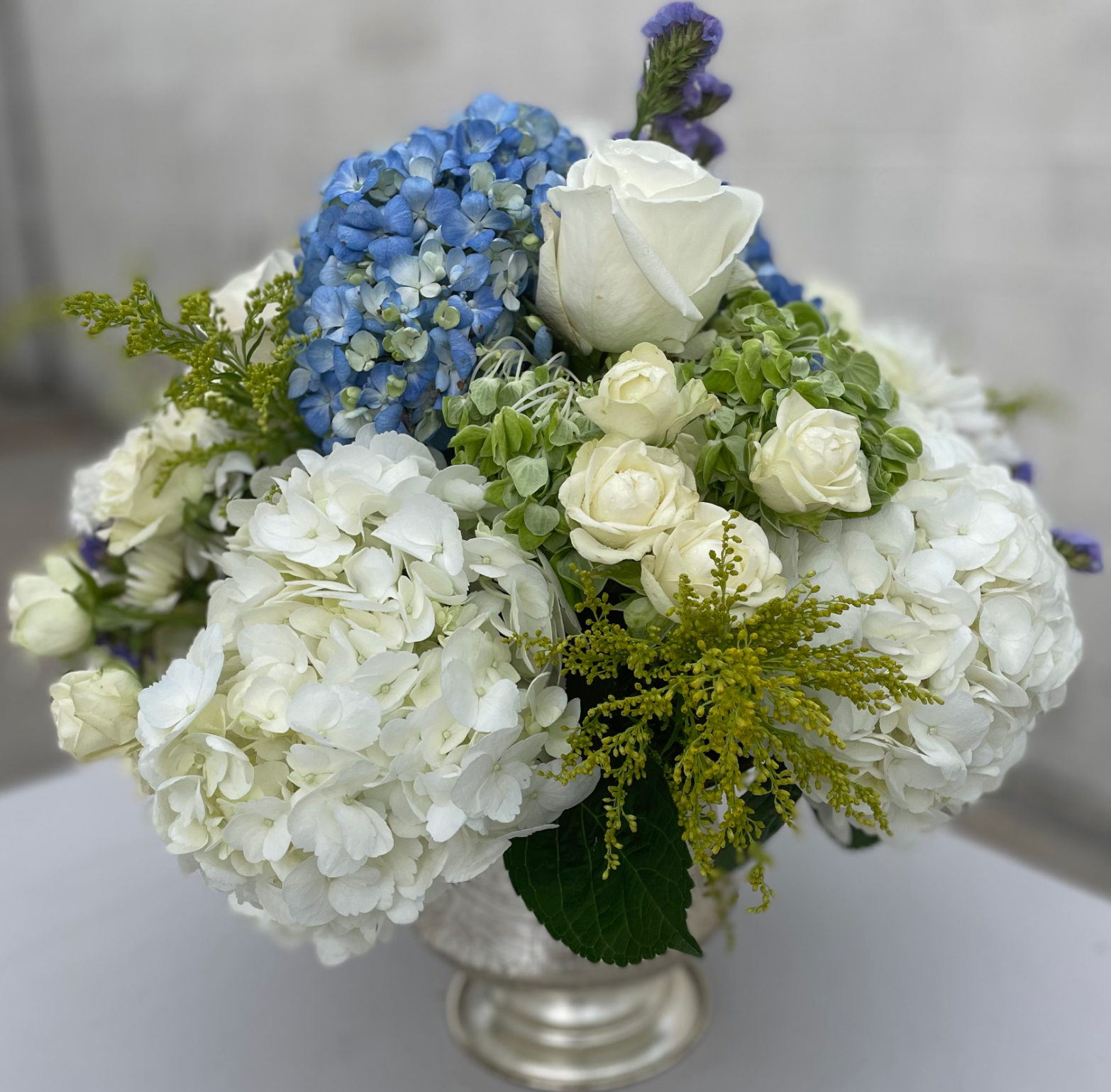 Blue and white floral arrangement by OmegaPix